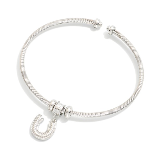 Twisted Metal Cuff Bracelet Featuring Rhinestone Horseshoe Charm

- Approximately 2.5" D 