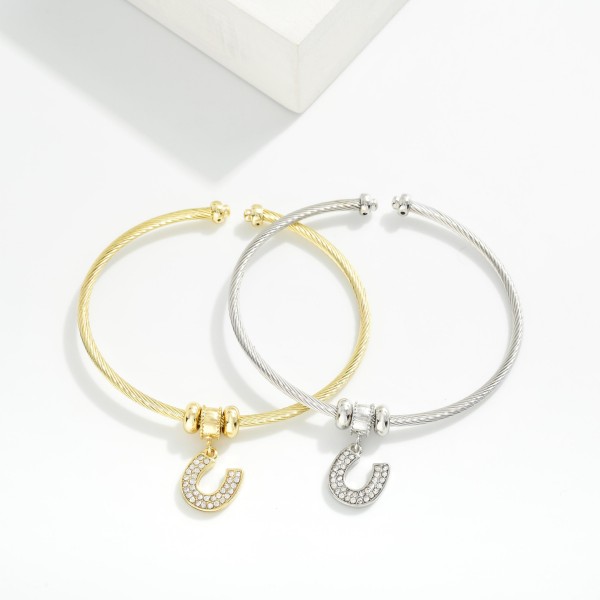 Twisted Metal Cuff Bracelet Featuring Rhinestone Horseshoe Charm

- Approximately 2.5" D 