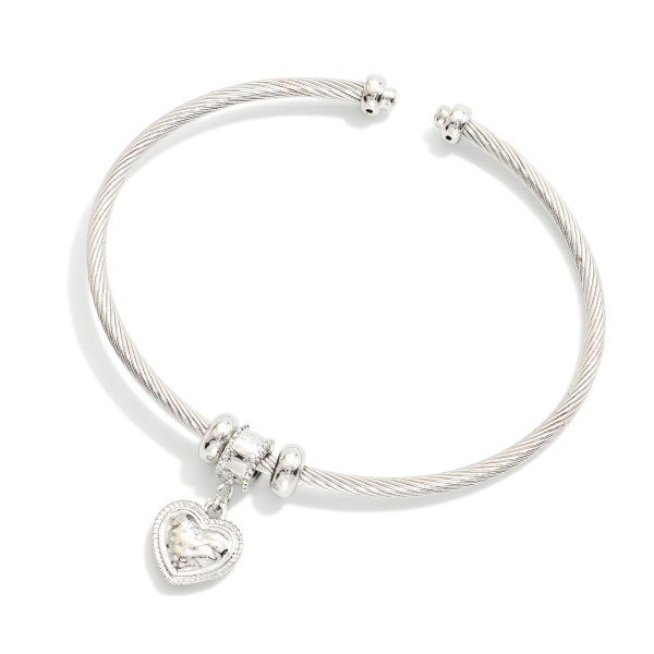 Twisted Metal Cuff Bracelet Featuring Rhinestone Heart Charm

- Approximately 2.5" D 