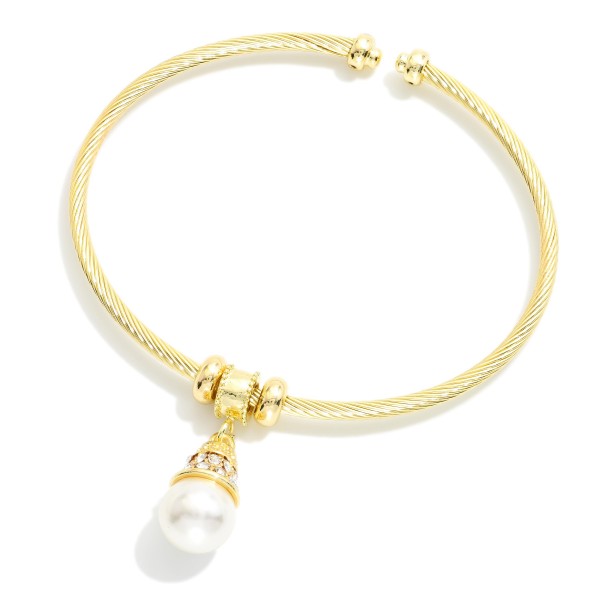 Twisted Metal Cuff Bracelet Featuring Rhinestone & Pearl Charm 

- Approximately 2.5" D 