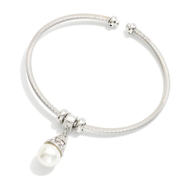 Twisted Metal Cuff Bracelet Featuring Rhinestone & Pearl Charm 

- Approximately 2.5" D 