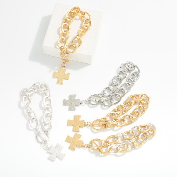 Hammered Metal Chain Link Bracelet With Plus Cross Charm & Toggle Clasp 

- Approximately 3" D