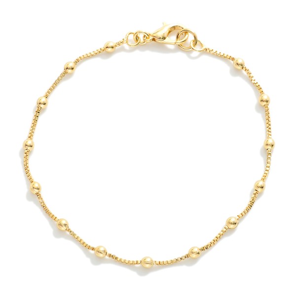 Square Chain Bracelet Featuring Metal Tone Ball Stations 

- Gold Filled
- Approximately 3.25" D