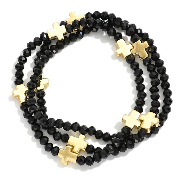 Set Of Three Faceted Bead Stretch Bracelets Featuring Metal Tone Cross Stations 

- Approximately 2.5" D