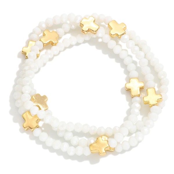 Set Of Three Faceted Bead Stretch Bracelets Featuring Metal Tone Cross Stations 

- Approximately 2.5" D