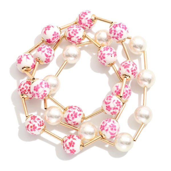 Set Of Three Beaded Stretch Bracelets Featuring Pearls, Metal Tone Tube, & Floral Porcelain Beads

- Approximately 3" D