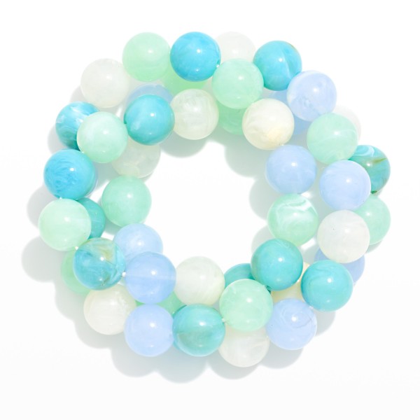 Set Of Three Marbled Acetate Beaded Bracelets 

- Approximately 2.5" D

