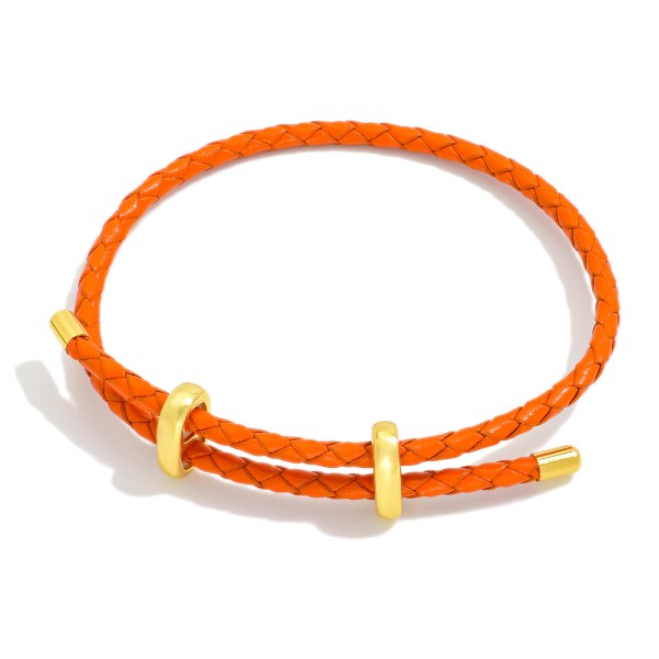 Woven Leather Adjustable Bracelet With Gold Tone Accents 

- Approximately 2.5" D