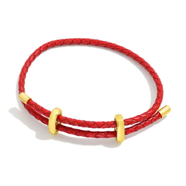 Woven Leather Adjustable Bracelet With Gold Tone Accents 

- Approximately 2.5" D