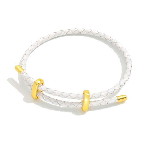 Woven Leather Adjustable Bracelet With Gold Tone Accents 

- Approximately 2.5" D