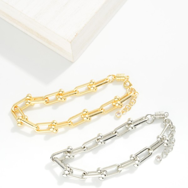Magnetic U Link Chain Link Bracelet

- Gold Dipped
- Approximately 3" D
- Extender 1" L