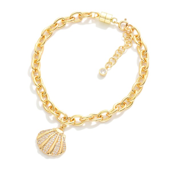 Magnetic Chain Link Bracelet Featuring Metal Tone & Cubic Zirconia Shell Charm 

- Gold Dipped
- Approximately 3" D
- Extender 1" L 
