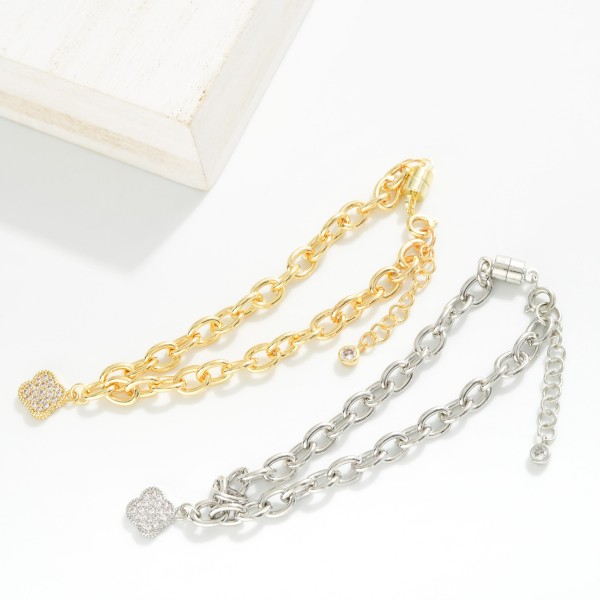 Magnetic Chain Link Bracelet Featuring Cubic Zirconia Clover Charm 

- Gold Dipped 
- Approximately 3" D
- Extender 1" L