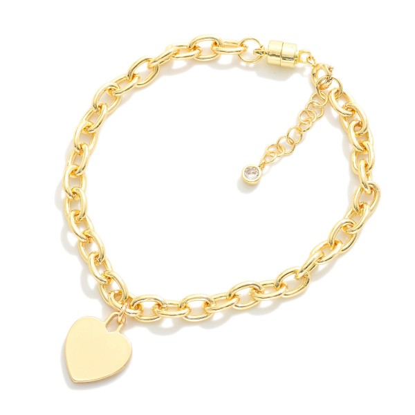 Magnetic Chain Link Bracelet Featuring Metal Tone Heart Charm 

- Gold Dipped 
- Approximately 3" D
- Extender 1" L
