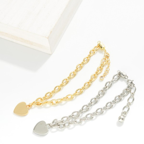 Magnetic Chain Link Bracelet Featuring Metal Tone Heart Charm 

- Gold Dipped 
- Approximately 3" D
- Extender 1" L
