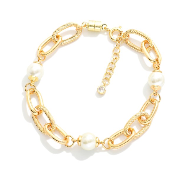 Magnetic Chain Link Bracelet Featuring Pearl Stations 

- Gold Dipped
- Approximately 3" D
- Extender 1" L 