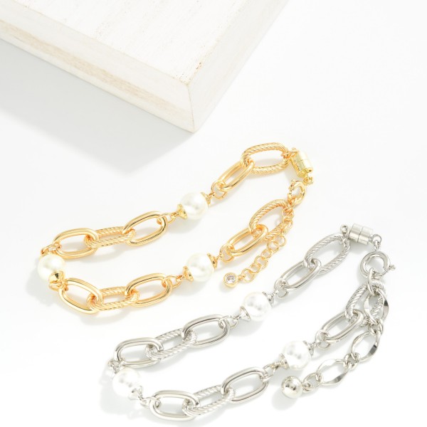 Magnetic Chain Link Bracelet Featuring Pearl Stations 

- Gold Dipped
- Approximately 3" D
- Extender 1" L 