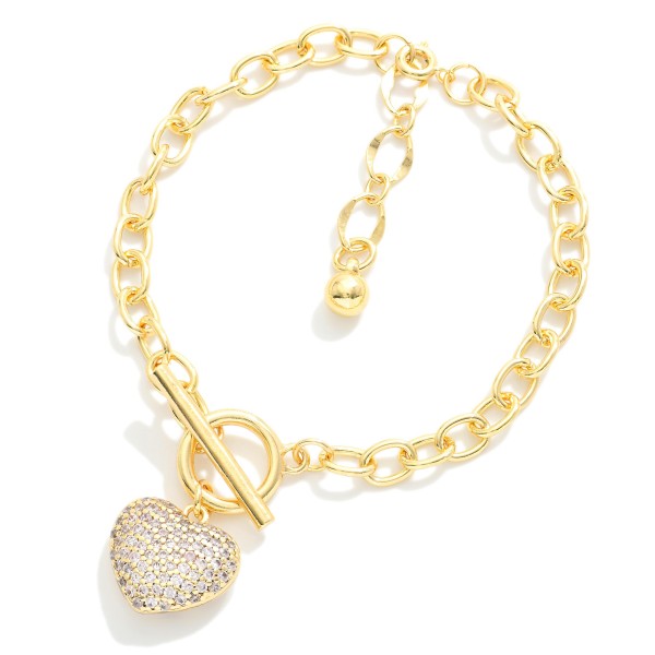 Magnetic Chain Link Bracelet Featuring Puffy Pave Cubic Zirconia Heart & Toggle Clasp 

- Gold Dipped
- Approximately 3" D
- Extender 1" L 