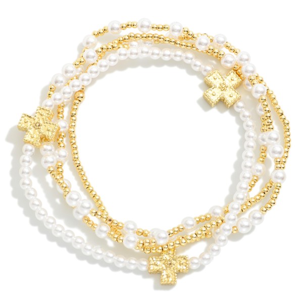 Set Of Four Metal Tone & Pearl Beaded Stretch Bracelets Featuring Textured Plus Cross Stations

- Approximately 2.5" D