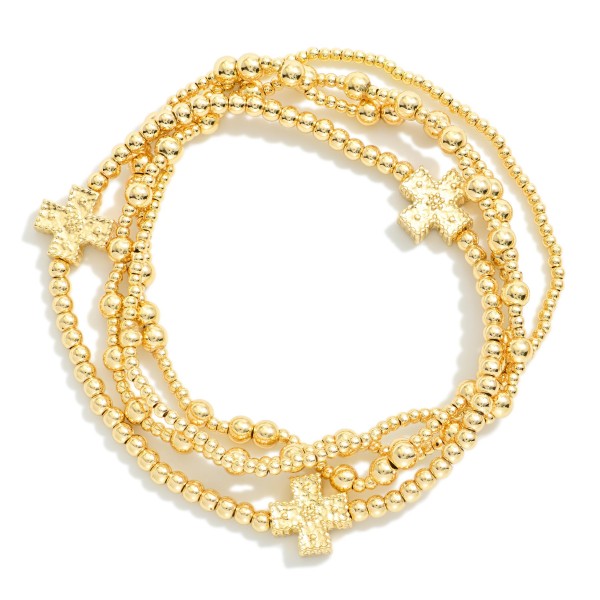Set Of Four Metal Tone Beaded Stretch Bracelets Featuring Textured Plus Cross Stations

- Approximately 2.5" D