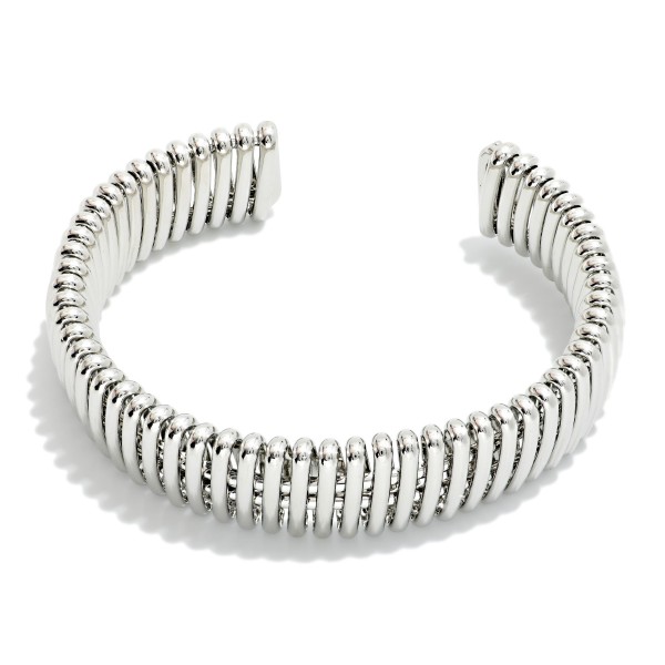 Do Everything In Love Metal Tone Tubogas Cuff Bracelet 

- Gold Dipped
- Approximately 2.25" D