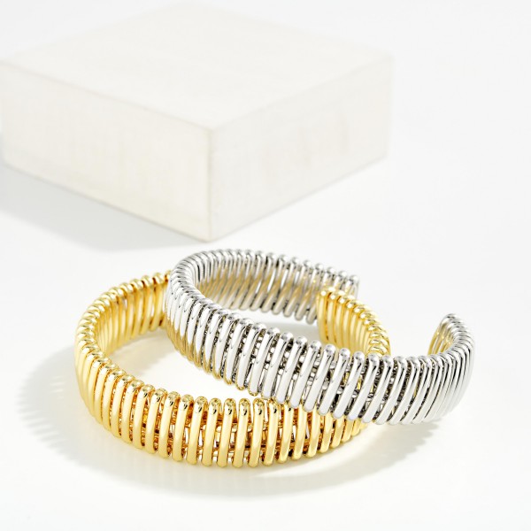 Do Everything In Love Metal Tone Tubogas Cuff Bracelet 

- Gold Dipped
- Approximately 2.25" D