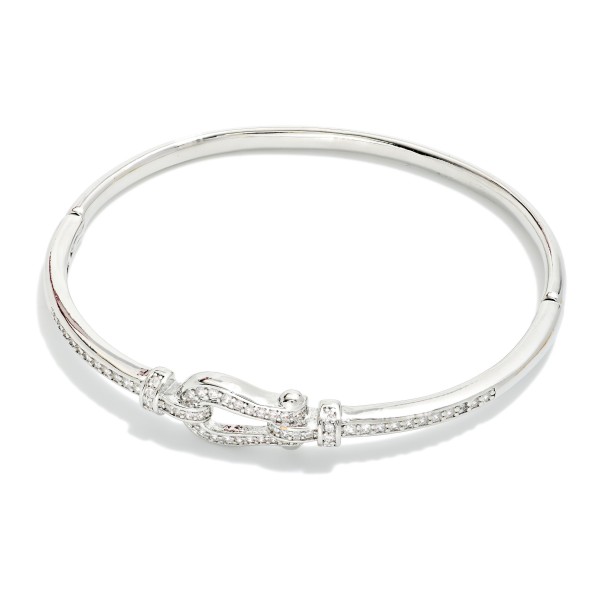 Metal Tone Clasp Bangle Bracelet Featuring Cubic Zirconia Detail  

- Approximately 2.5" D 
- Gold Dipped
- Hypoallergenic