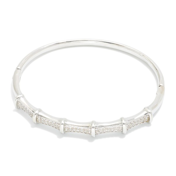 Metal Tone Bamboo Bangle Bracelet Featuring Cubic Zirconia Detail  

- Approximately 2.5" D 
- Gold Dipped
- Hypoallergenic