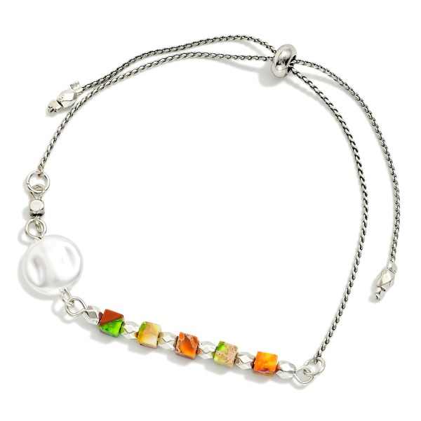 Beaded Bracelet Featuring Pearl Baroque and Bolo Slide Adjustment

- Approximately 3" D 
- Adjustable Cord