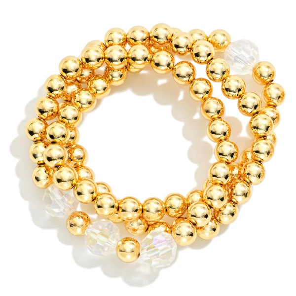 Set Of Three Metal Tone Beaded Stretch Bracelet Featuring Faceted Glass Bead

- Approximately 2.5" D 