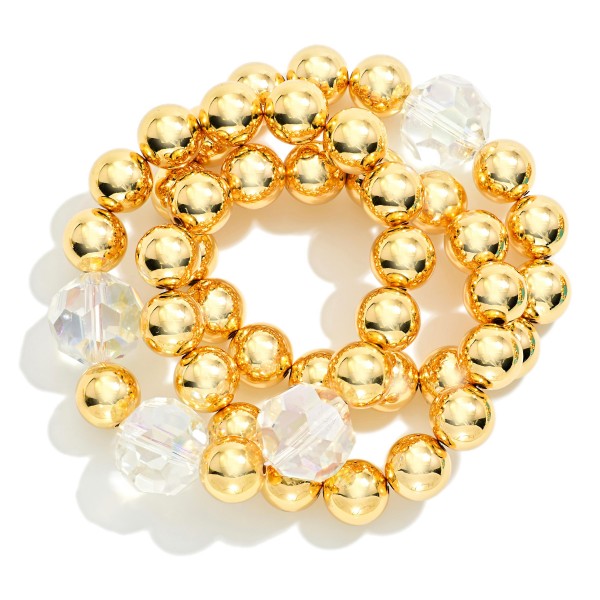 Set Of Three Big Metal Tone Beaded Stretch Bracelet Featuring Faceted Glass Bead

- Approximately 3" D 