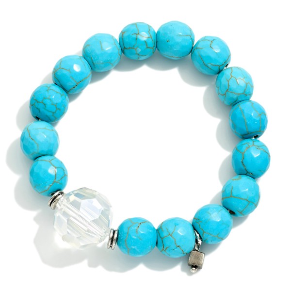 Stone Beaded Stretch Bracelet Featuring Faceted Glass Bead

- Approximately 2.75" D 
