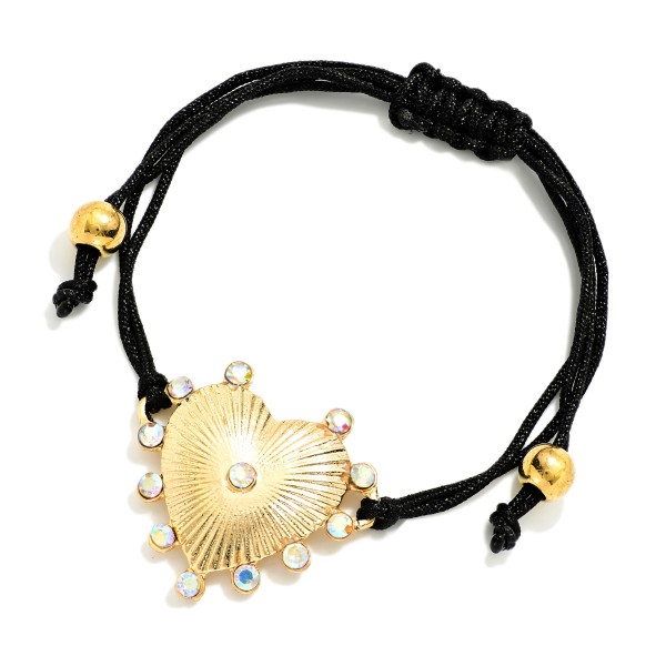 Adjustable Cord Bracelet Featuring Metal Tone Heart Charm & Rhinestone Accents 

- Approximately 3" D
