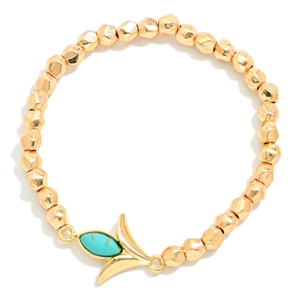Metal Tone Beaded Stretch Bracelet Featuring Metal Tulip Shaped Charm 

- Approximately 2.5" D 