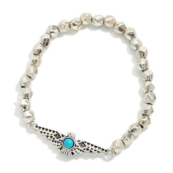 Metal Tone Beaded Stretch Bracelet Featuring Metal Bird Charm With Turquoise Accents

- Approximately 2.5"  