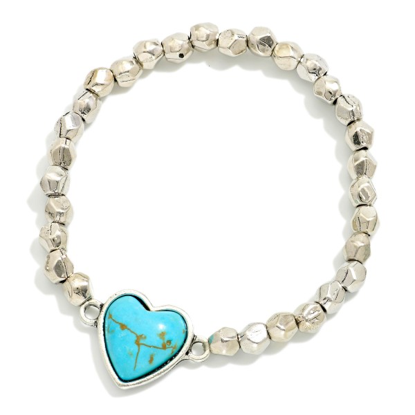 Metal Tone Beaded Stretch Bracelet Featuring Metal Heart Charm With Turquoise Accents

- Approximately 2.5"  