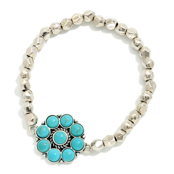 Metal Tone Beaded Stretch Bracelet Featuring Metal Flower Charm With Turquoise Accents

- Approximately 2.5"  