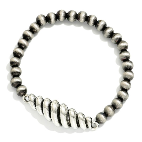 Brushed Metal Beaded Stretch Bracelet Featuring Twisted Metal Charm 

- Approximately 2.5"  