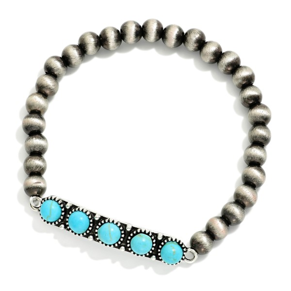 Metal Tone Brushed Beaded Stretch Bracelet Featuring Metal Western Charm With Turquoise Accents

- Approximately 2.5"  
