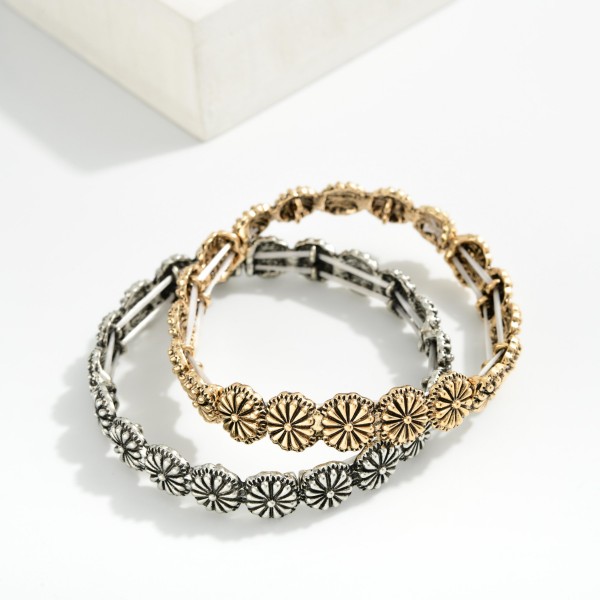 Metal Tone Flower Bangle Stretch Bracelet Featuring 

- Approximately 2.5" D 