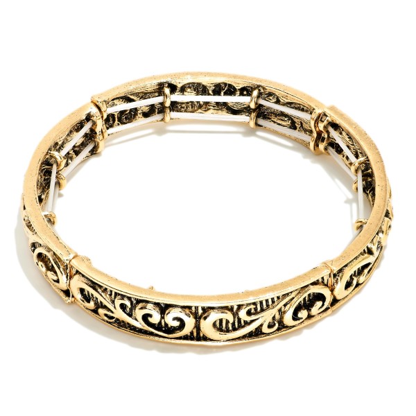 Metal Tone Bangle Stretch Bracelet Featuring Rococo Engraving 

- Approximately 2.5" D 