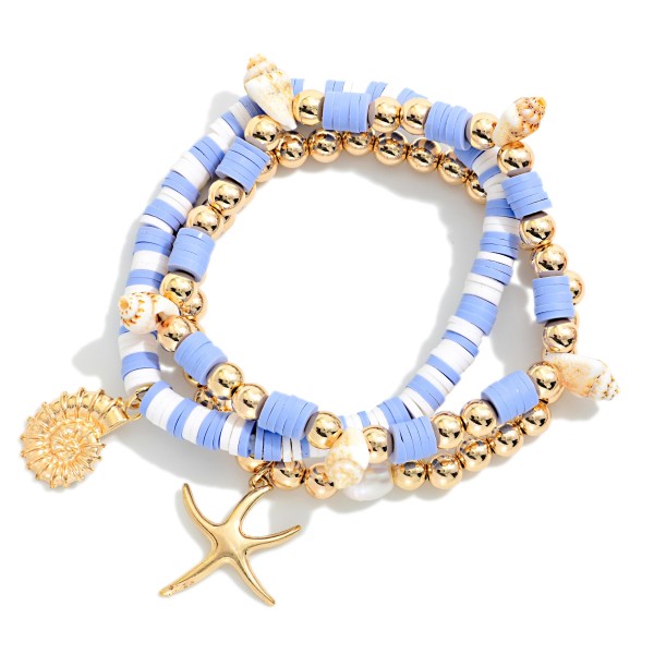 Set Of Three Heishi Beaded And Metal Ball Beaded Bracelet Featuring Shells And Gold Tones

- Approximately 3.5" D

