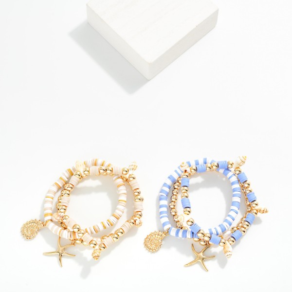 Set Of Three Heishi Beaded And Metal Ball Beaded Bracelet Featuring Shells And Gold Tones

- Approximately 3.5" D

