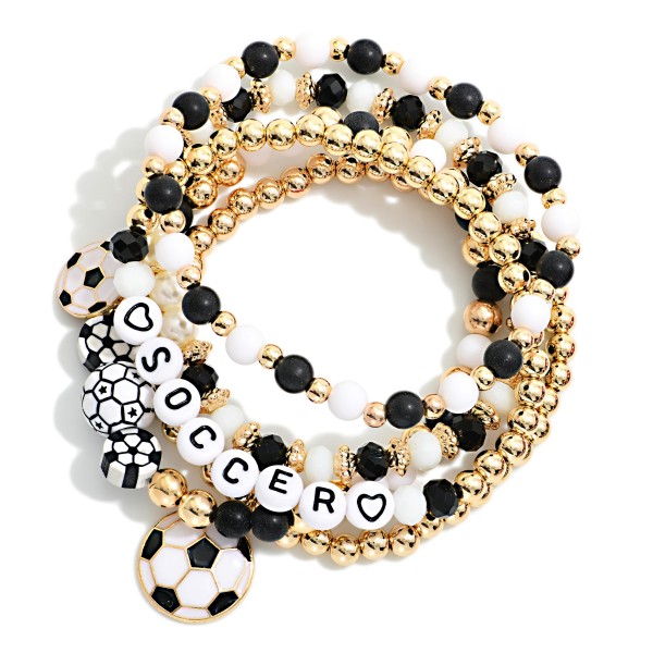 Set Of Five Soccer Themed Stretch Bracelet Featuring Mixed Beads, Gold Tones, And "SOCCER" Beaded Letters

- Approximately 3.5" D