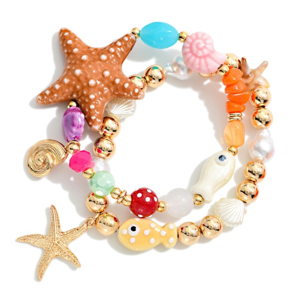 Set Of Two Mixed Beaded Bracelet Featuring Mixed Beads And Sea Charms 

- Approximately 3.5"D 