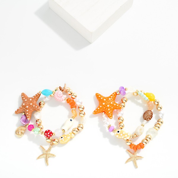 Set Of Two Mixed Beaded Bracelet Featuring Mixed Beads And Sea Charms 

- Approximately 3.5"D 