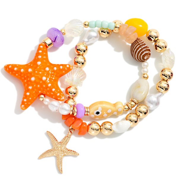 Set Of Two Mixed Beaded Bracelet Featuring Mixed Beads And Sea Charms 

- Approximately 3.5"D 