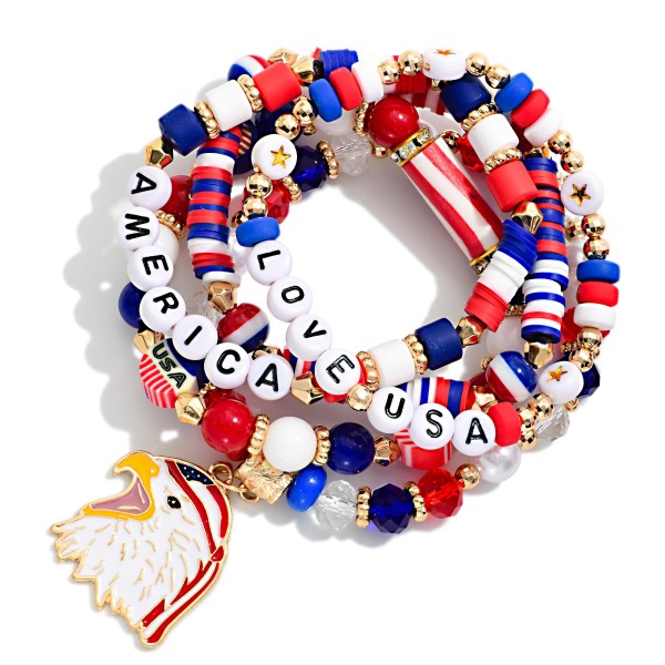 Set Of Five Americana Themed Stretch Bracelet Featuring Mixed Beads, Gold Tones, Charms, And "AMERICA" & "LOVE USA" Beaded Letters

- Approximately 3.5" D