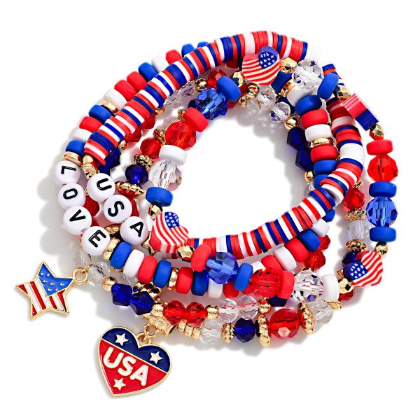 Set Of Five Americana Themed Stretch Bracelet Featuring Mixed Beads, Gold Tones, "USA" Heat Charm, And "USA" & "LOVE" Beaded Letters

- Approximately 3.5" D