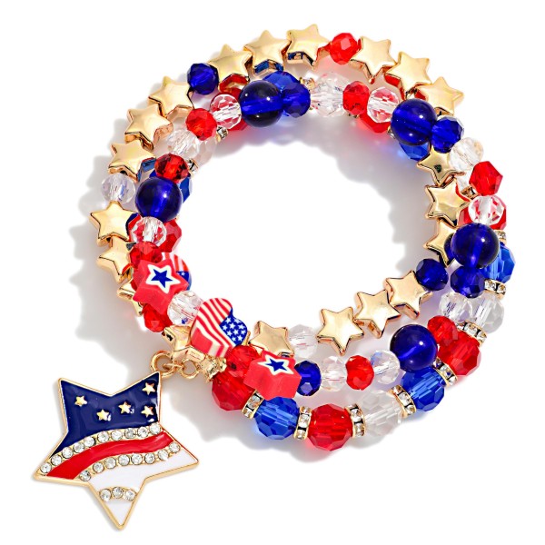 Set Of Three Americana Themed Stretch Bracelet Featuring Gold Tones And Star Flag Charm

- Approximately 3.5" D 